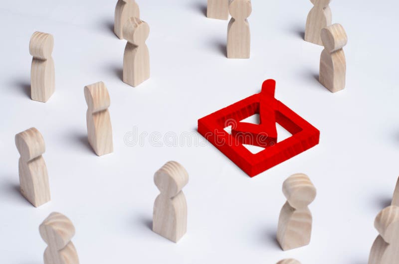 People gathered around the checkbox on a white background. People make a group choice. Democratic elections, collective decision a stock image People gathered around the checkbox on a white background. People make a group choice. Democratic elections, collective decision a stock image