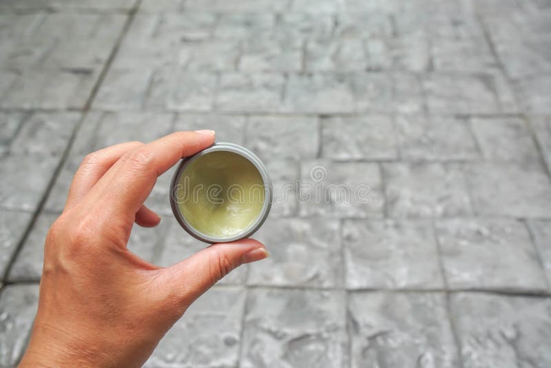 People hand hold setting wax product in for hair styling before going to work stock images