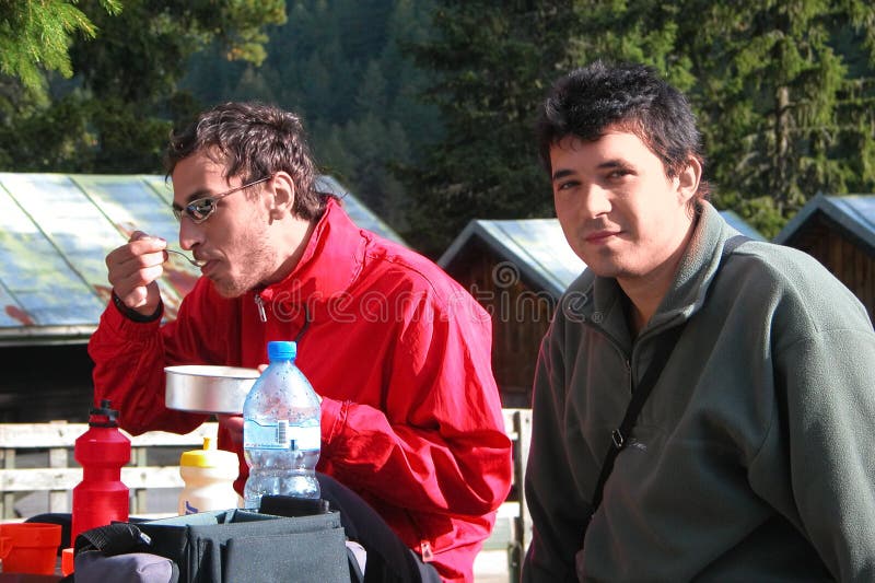 People having breakfast outdoors