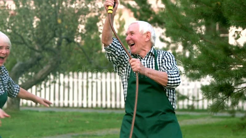 People with hose having fun.