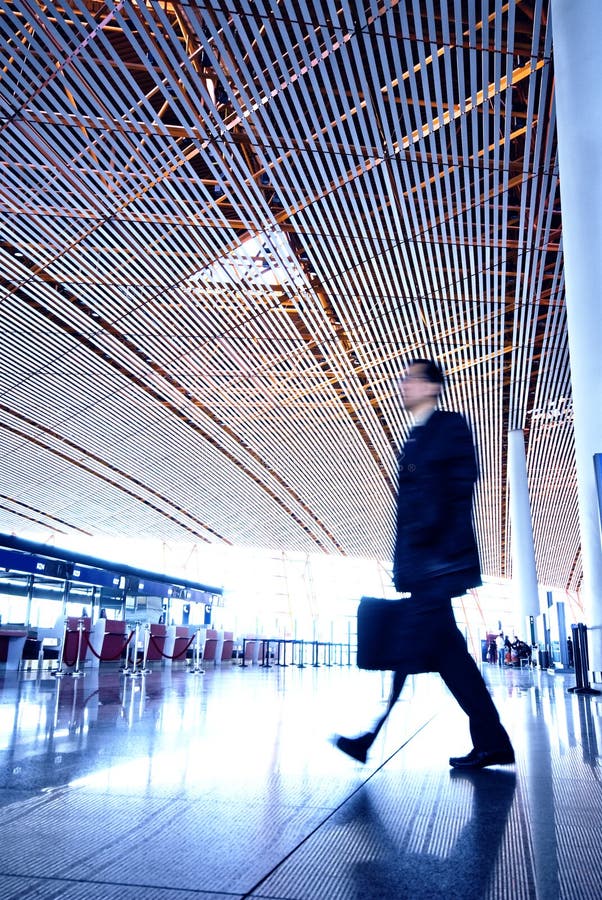 People hurrying in airport