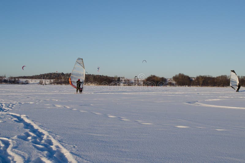 People ice sail surf kiteboard snow lake winter stock images People ice sail surf kiteboard snow lake winter stock images