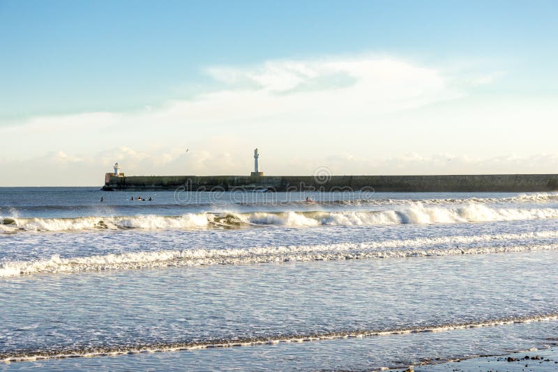 People on kayaks in North Sea near South Breakwater, Aberdeen, Scotland stock photos People on kayaks in North Sea near South Breakwater, Aberdeen, Scotland stock photos