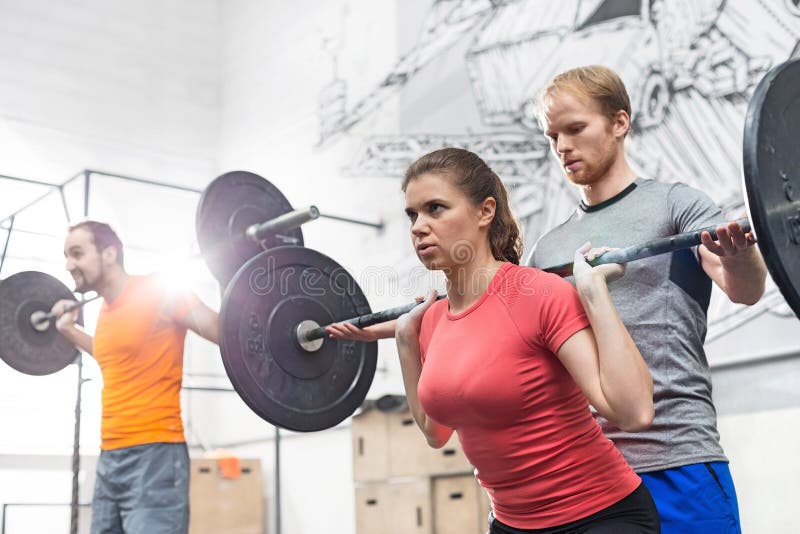 People Lifting Barbells in Crossfit Gym Stock Photo Image of barbell