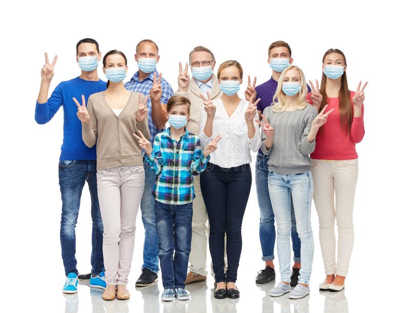 People in medical masks showing peace hand sign stock photo People in medical masks showing peace hand sign stock photo