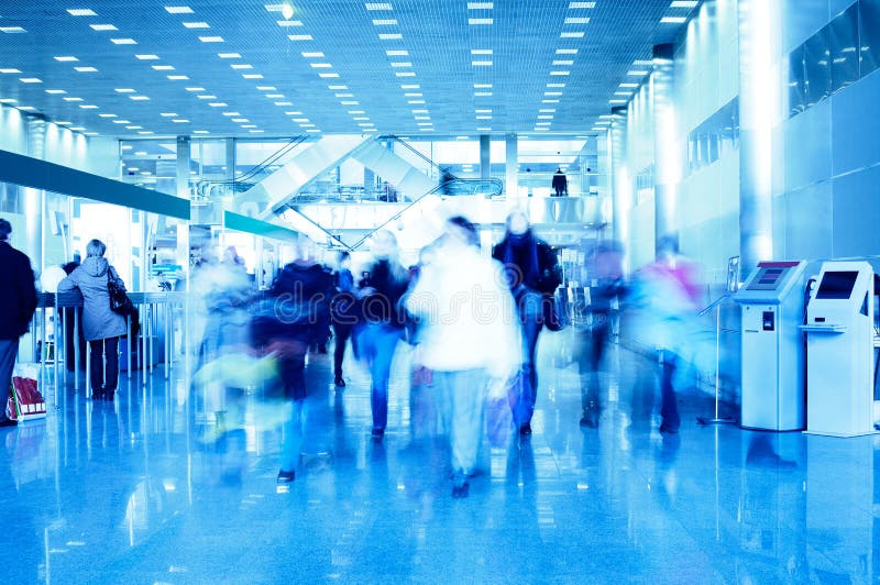 People in a modern architectural interior royalty free stock photo