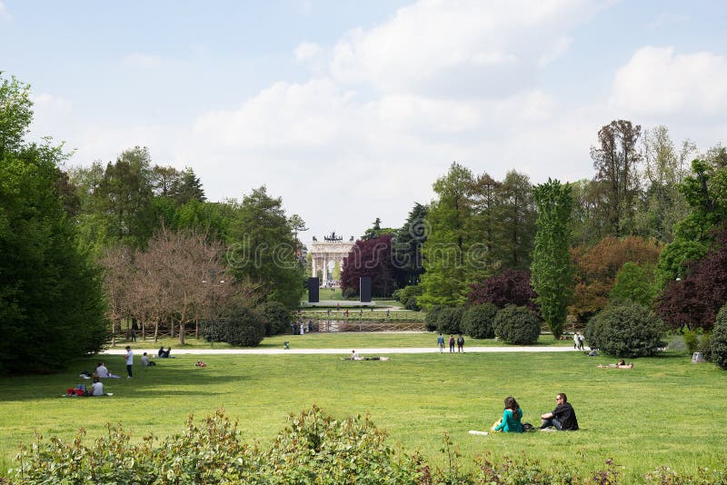People in park public garden, Arco della Pac of Parco Sempione, Milan royalty free stock photo People in park public garden, Arco della Pac of Parco Sempione, Milan royalty free stock photo