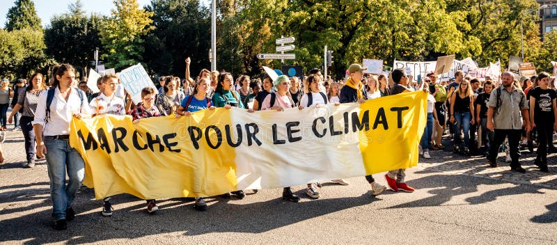 People rally for action on climate change yellow placard stock photos People rally for action on climate change yellow placard stock photos