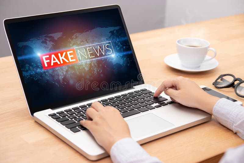 People reading fake news or HOAX on internet content via laptop.