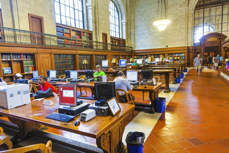 People in the Reading Room of New York s Public Library