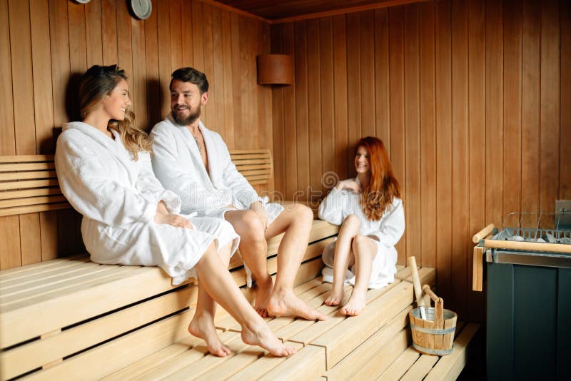 People relaxing in sauna stock images People relaxing in sauna stock images