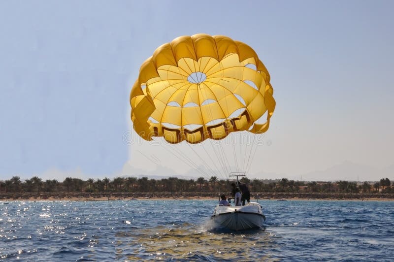 People Ride a Boat with a Parachute Editorial Stock Photo Image of