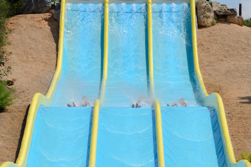 People Ride Water Slides in the Water Park Stock Photo Image of