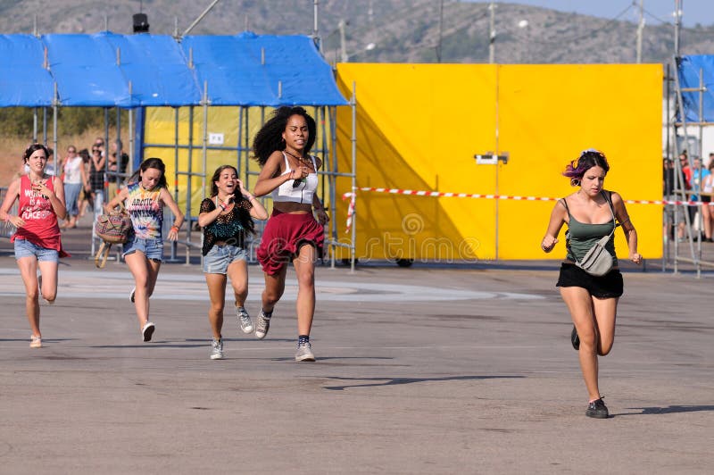People run to catch the first row after buying their tickets at FIB Festival stock image People run to catch the first row after buying their tickets at FIB Festival stock image