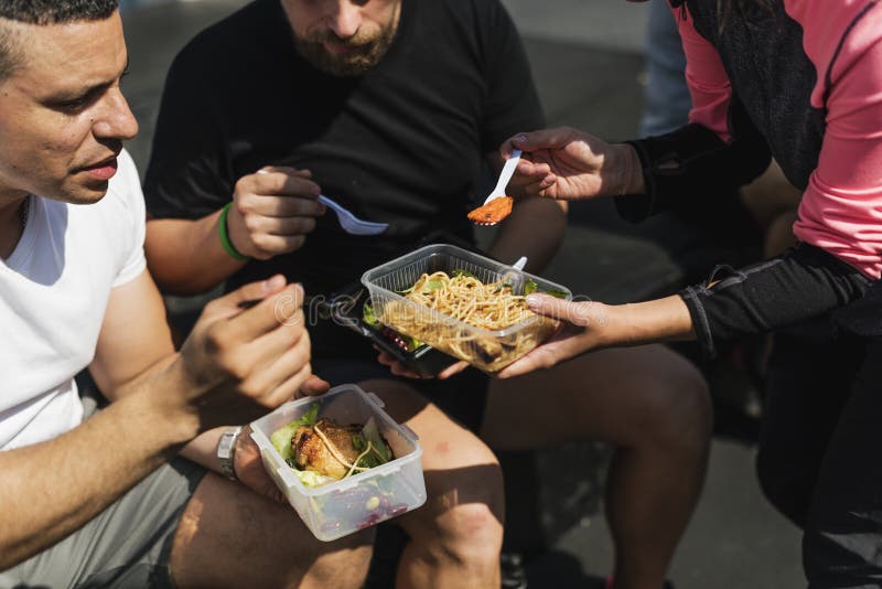 People sharing healthy food together