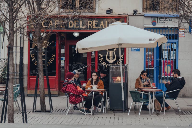 People Sitting at the Outdoor Tables of Cafe Del Real Cafe in Madrid ...