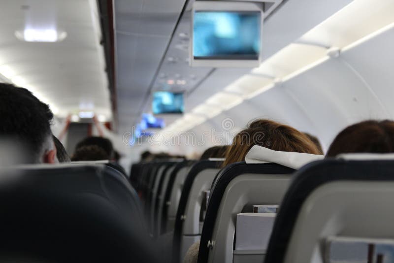 People are sitting on the plane royalty free stock photo People are sitting on the plane royalty free stock photo