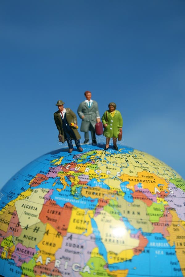 People standing on globe royalty free stock photography