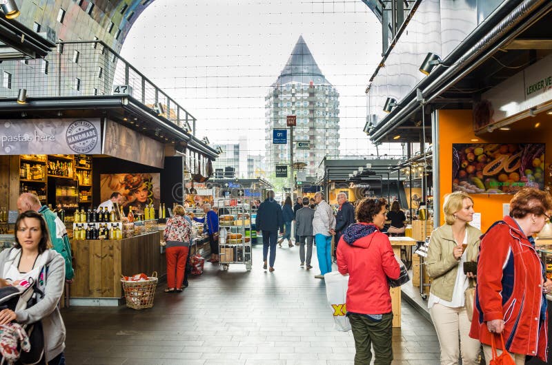 People Strolling Around a Market Hall royalty free stock photography People Strolling Around a Market Hall royalty free stock photography