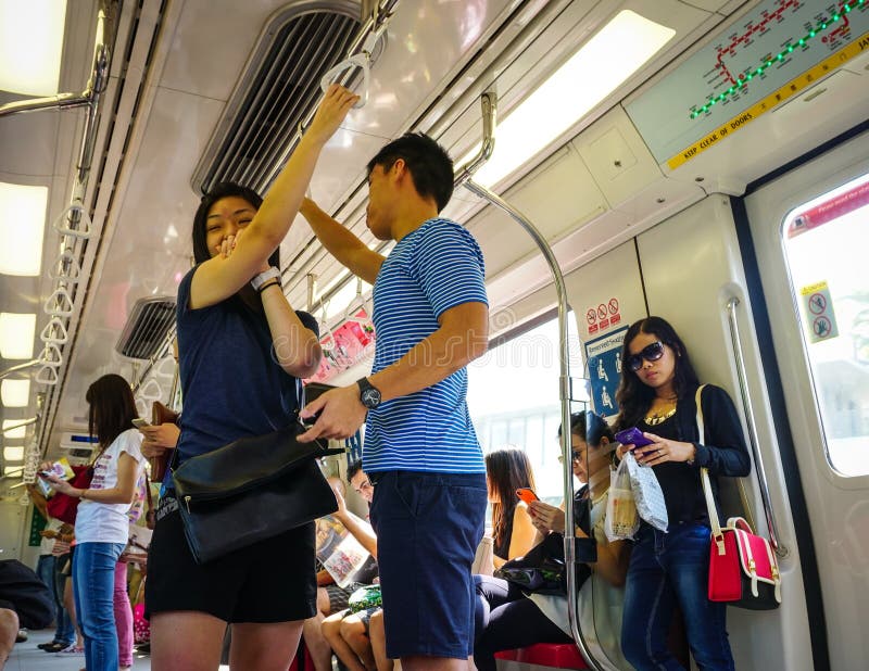 People on the subway train in Singapore royalty free stock images People on the subway train in Singapore royalty free stock images