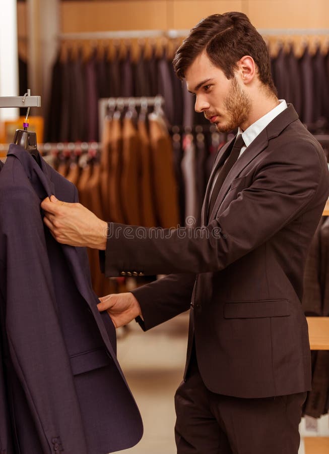 People in suit shop stock image. Image of market, dress - 66068765