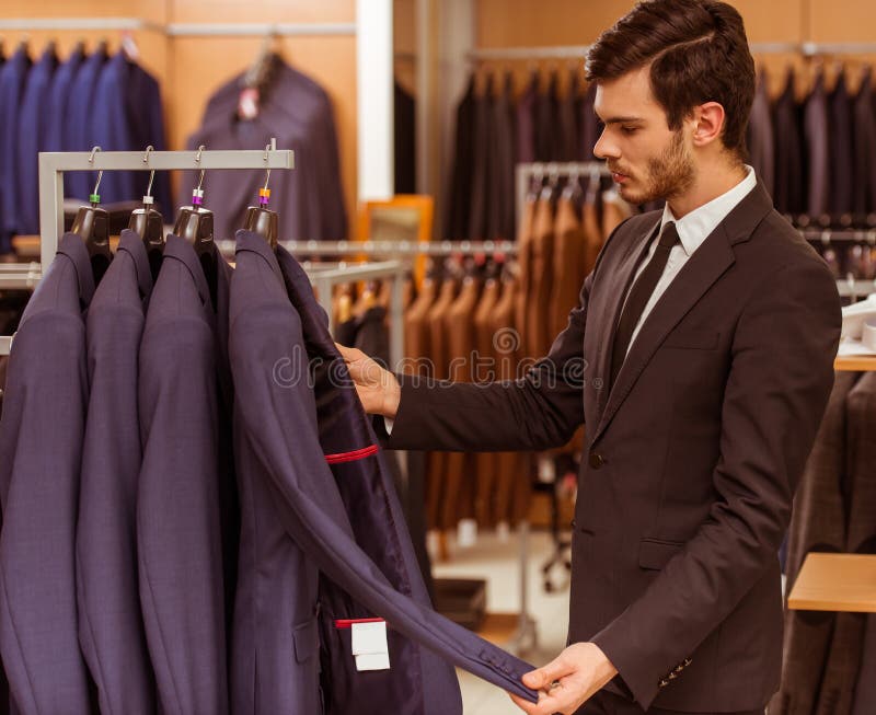 People in suit shop stock photo. Image of merchandise - 66068994