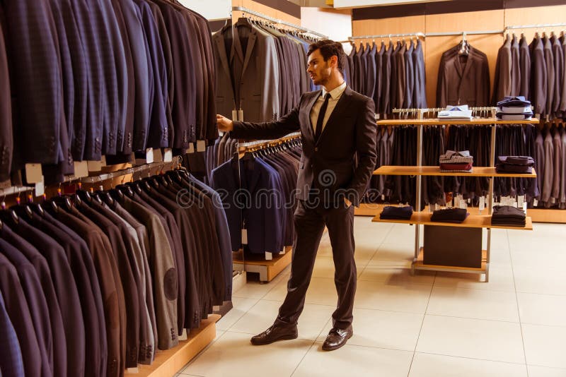 People in suit shop stock image. Image of mall, boutique - 66069247