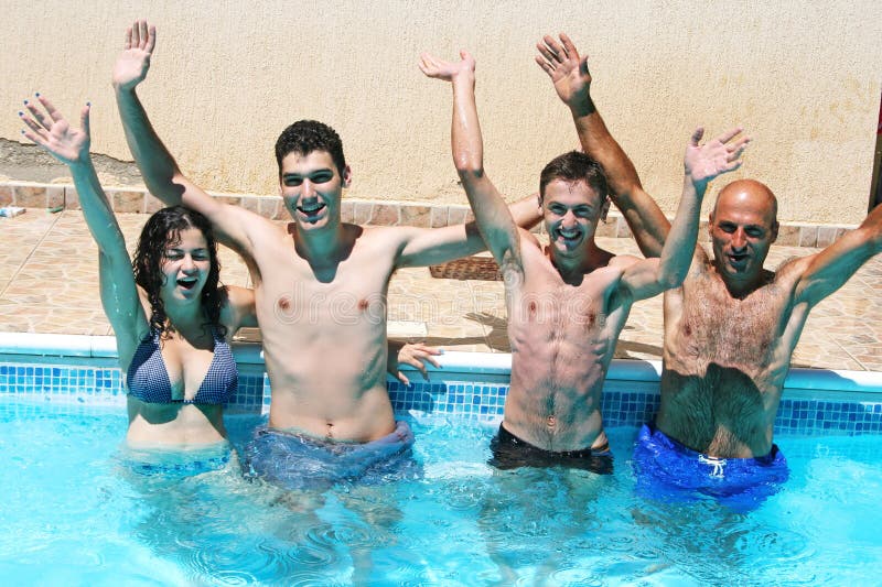 People having fun in swimming pool. People having fun in swimming pool.