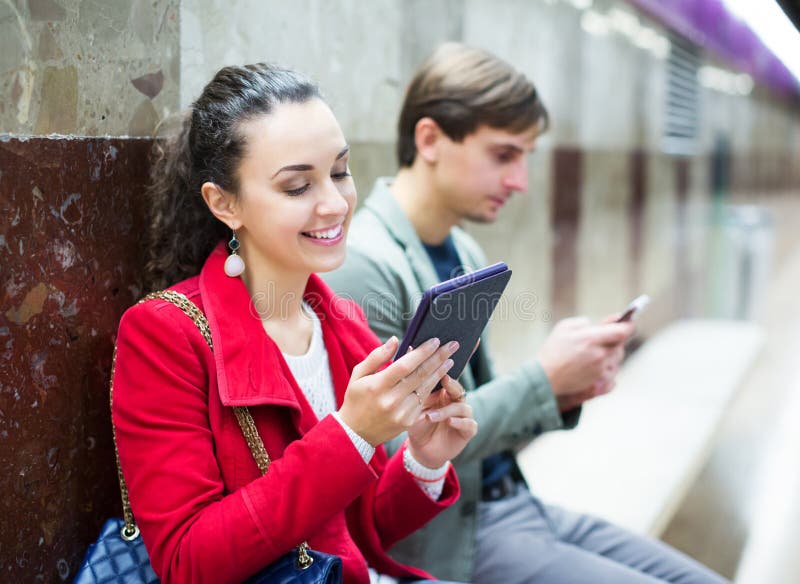 People with Tablet at Metro Stock Image Image of online, platform