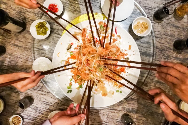 chinese new year tossing noodles