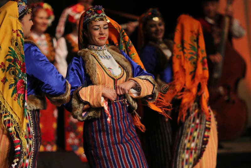 People in Traditional Folklore Costumes Perform Folk Dance Bulgarian ...