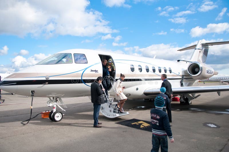People Travelling by Commercial Airplane stock image People Travelling by Commercial Airplane stock image