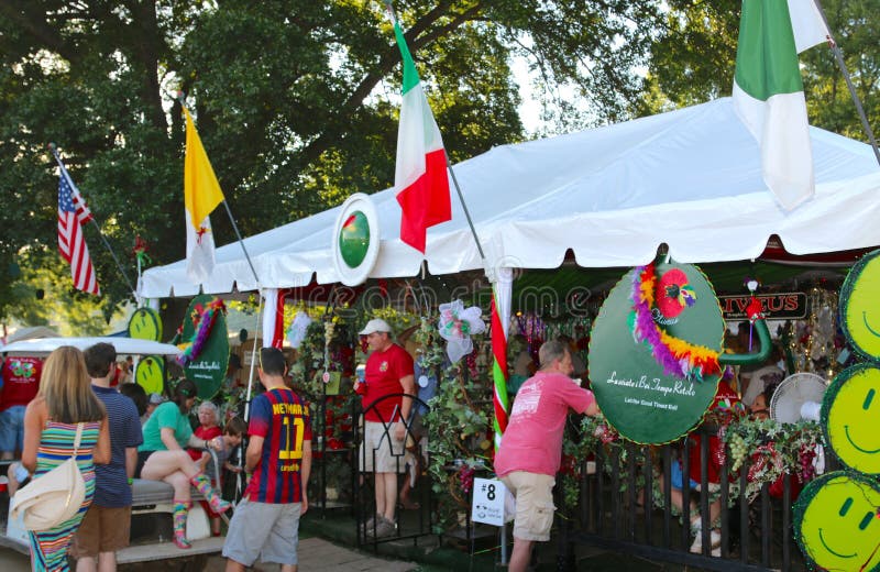 People Visit a Booth at the Memphis Italian Festival Editorial