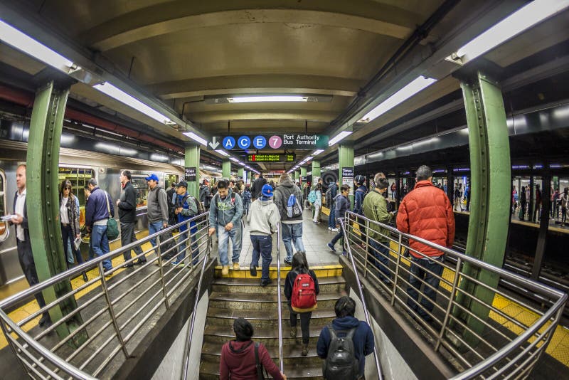 People wait at subway station times square in New York