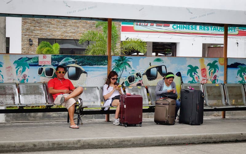 People waiting for the bus at station in Boracay, Philippines. Philippines atm machine stock images, royalty-free photos and pictures