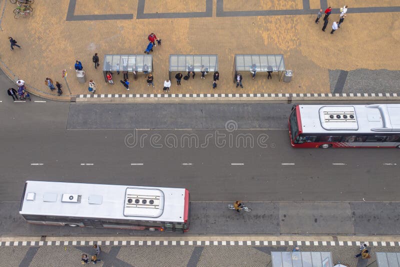 People Waiting at a Downtown Bus Stop in Groningen, Netherlands