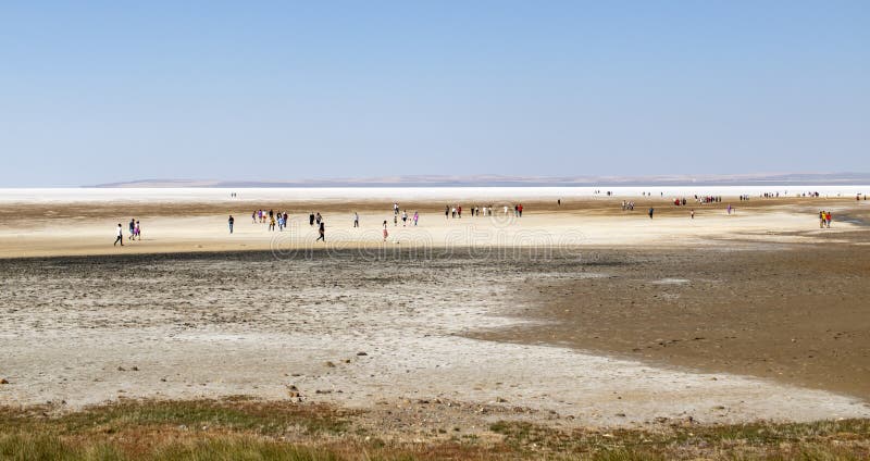 People walking on a drained salt lake. Ankara Turkey.