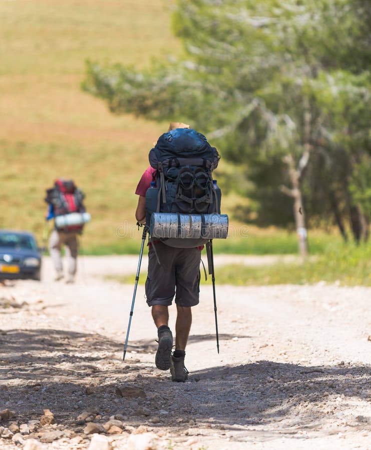People walking on foot stock photo. Image of backpacker 40068370