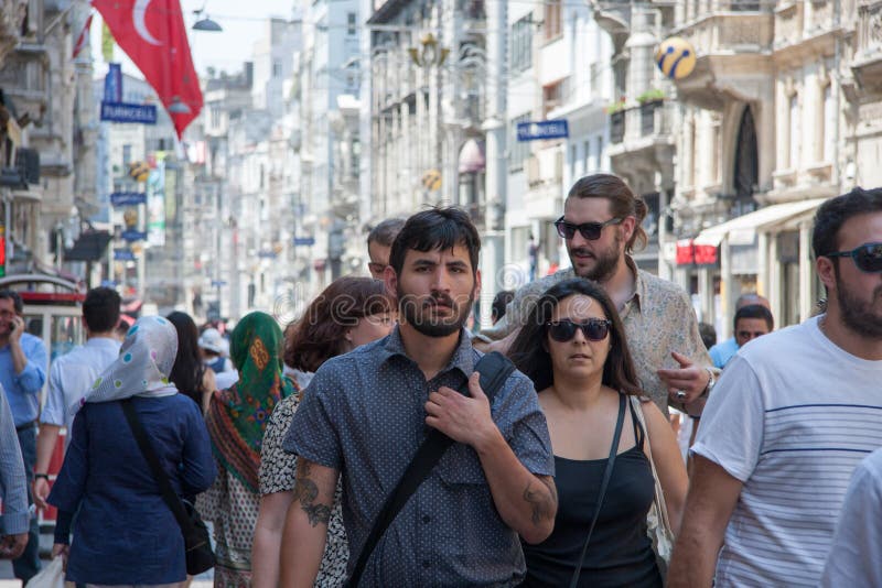 Istanbul, Turkey - July 15, 2015: Turkish men and women walking on Istiklal...