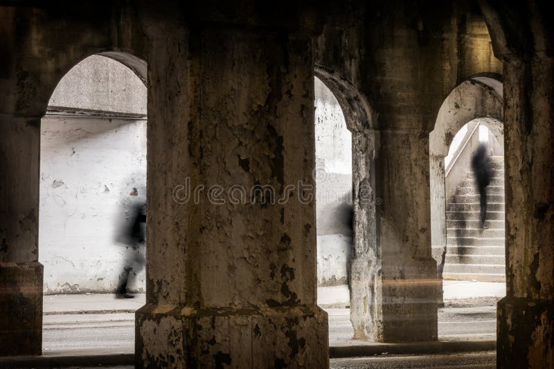 People walking up a stairway from an underground city street. stock photography People walking up a stairway from an underground city street. stock photography