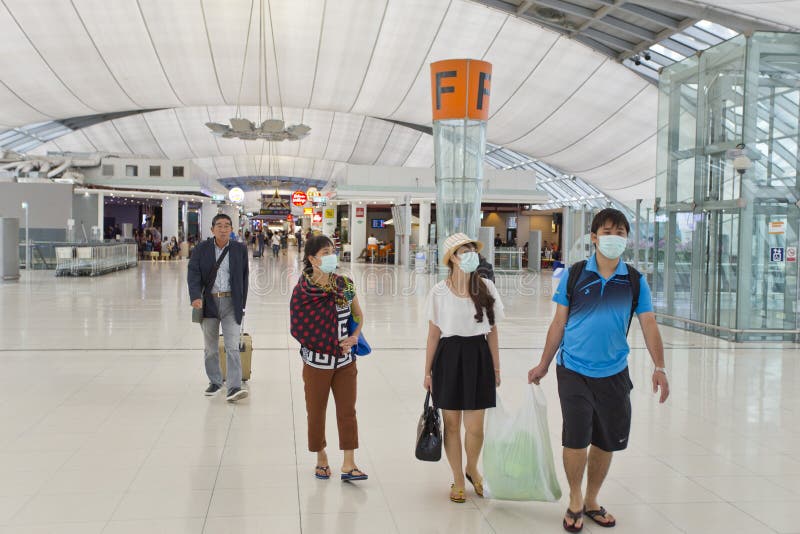 People wearing mask protection at the airport royalty free stock images People wearing mask protection at the airport royalty free stock images