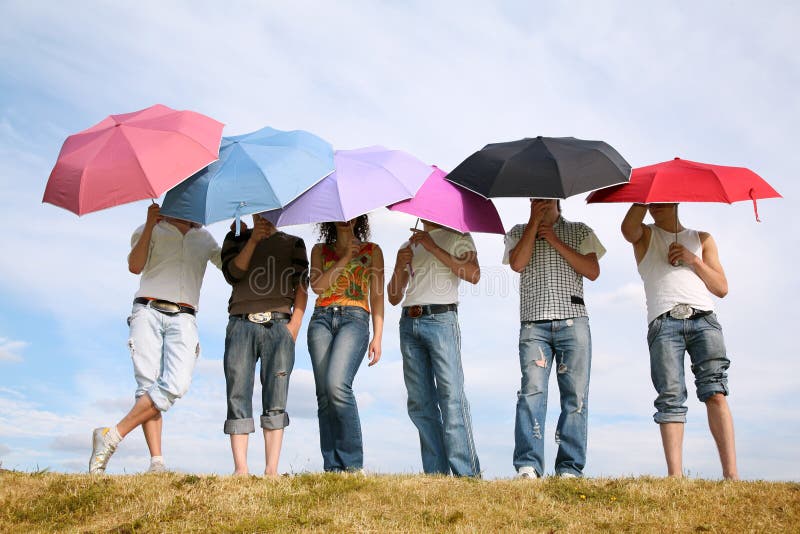 Peoples under umbrellas