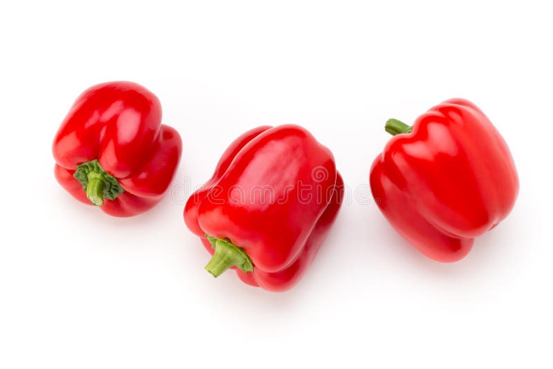 Peperone dolce rosso con la metà e foglie isolate su bianco immagini stock libere da diritti Peperone dolce rosso con la metà e foglie isolate su bianco immagini stock libere da diritti