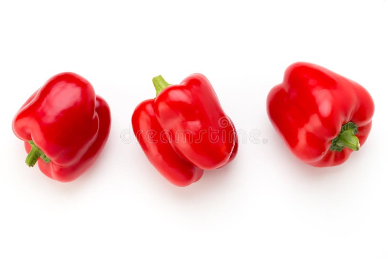Peperone dolce rosso con la metà e foglie isolate su bianco fotografie stock Peperone dolce rosso con la metà e foglie isolate su bianco fotografie stock