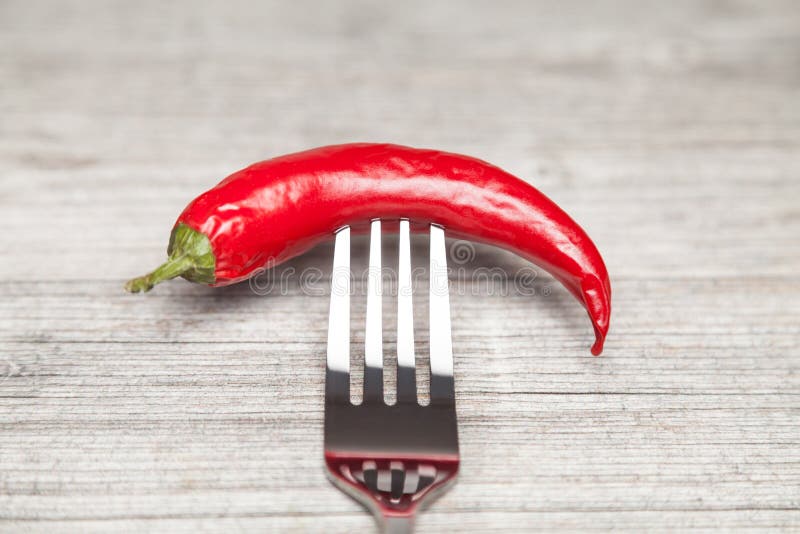 Peperoni and fork stock image. Image of cayenne, organic 54105049