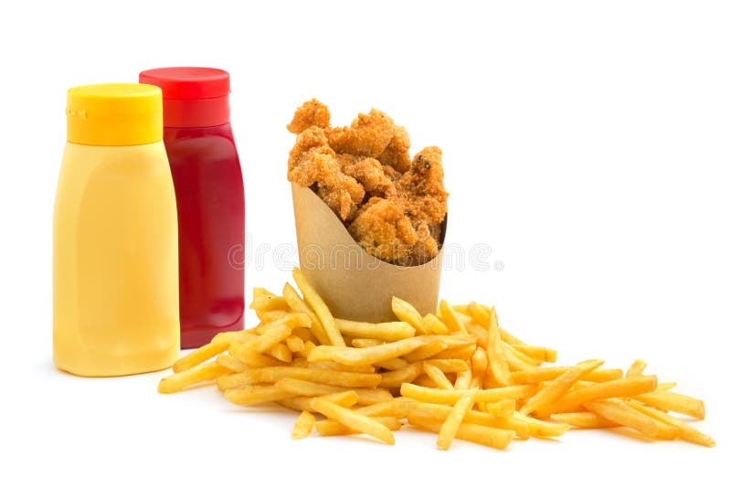 Chicken nuggets, fries and condiments on white background. Chicken nuggets, fries and condiments on white background