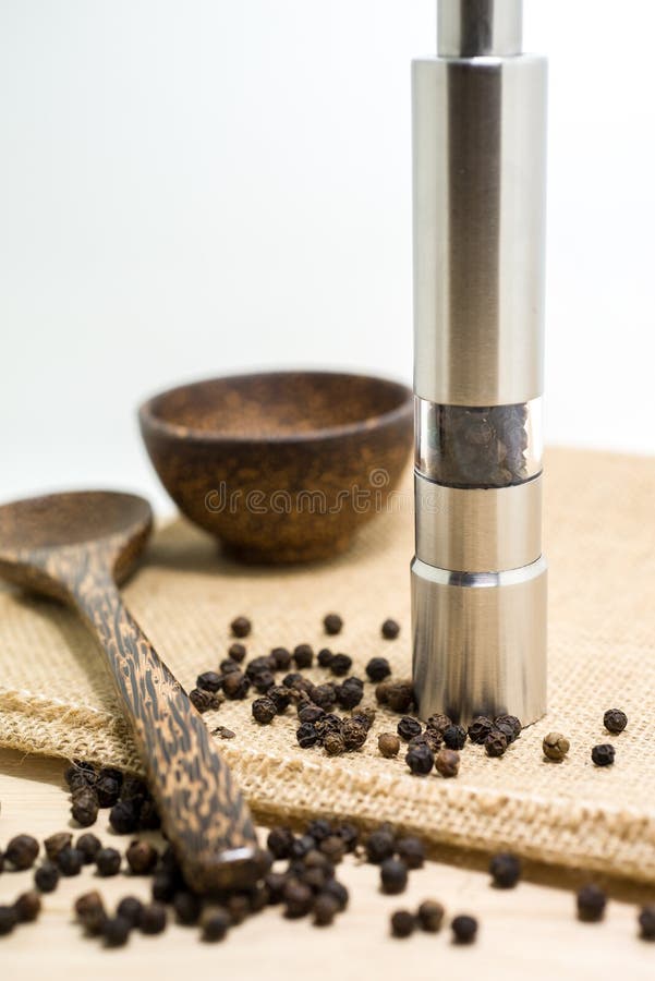 Pepper Grinder and Black Peppercorn Stock Photo Image of macro