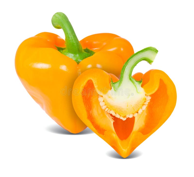 Photo of orange pepper slice in a heart shape isolated on white. Photo of orange pepper slice in a heart shape isolated on white