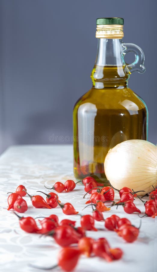 Pepper, Olive Oil, Garlic and Onion, Composition with Spices. Selective Focus Stock Photo