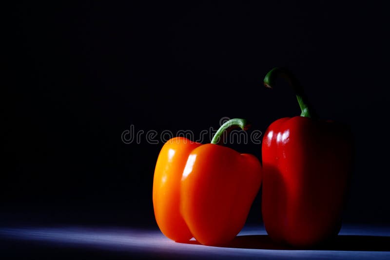 Pepper pair on a drak background